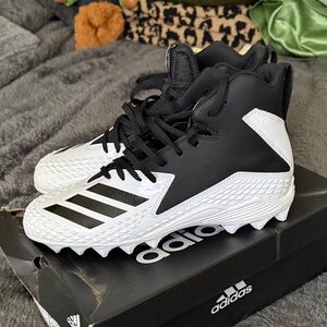 Adidas Black and White High-Top Cleats